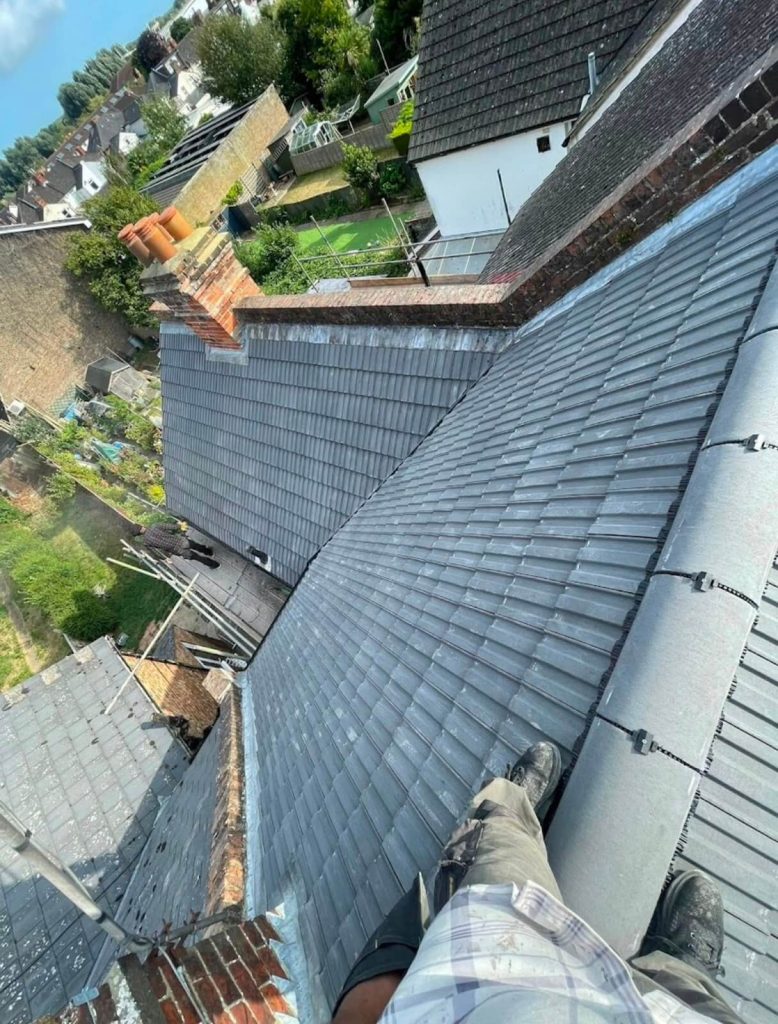 roofer on a new roof